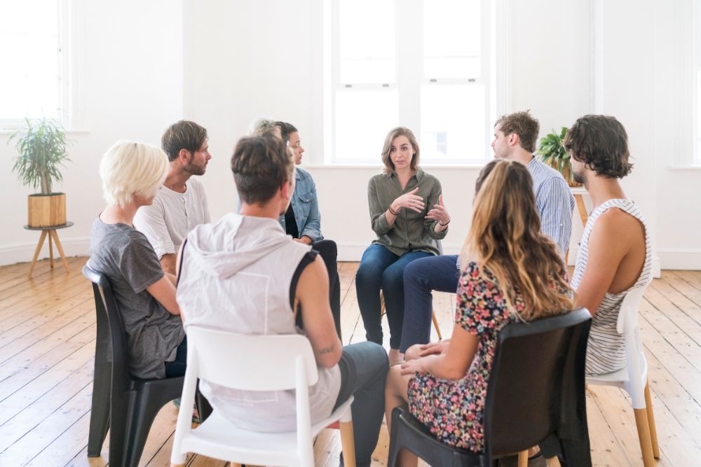 Support group in a sober living discussion
