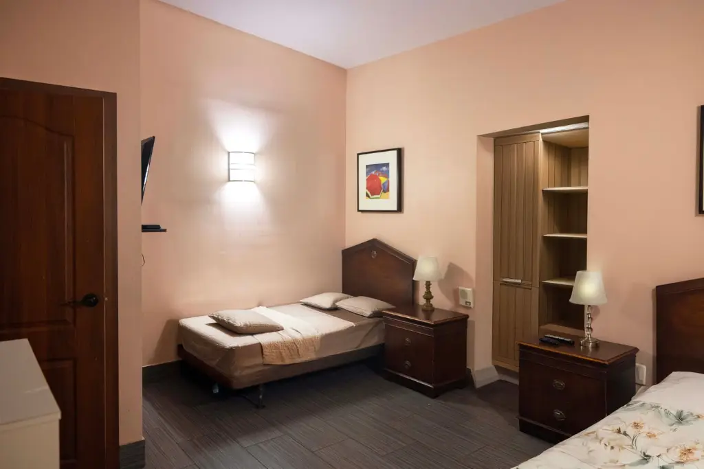 Private residential bedroom for clients at Harbor Village treatment center Miami